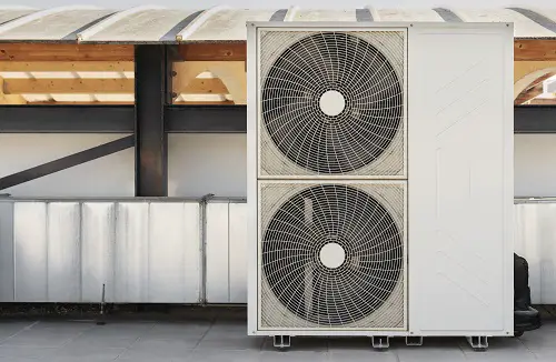 heat pump outdoor unit on a roof
